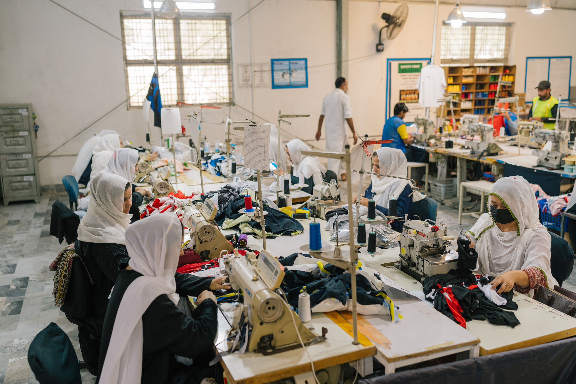 In-line inspection of sublimated uniforms and sports jerseys